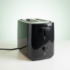 Black toaster on a white background