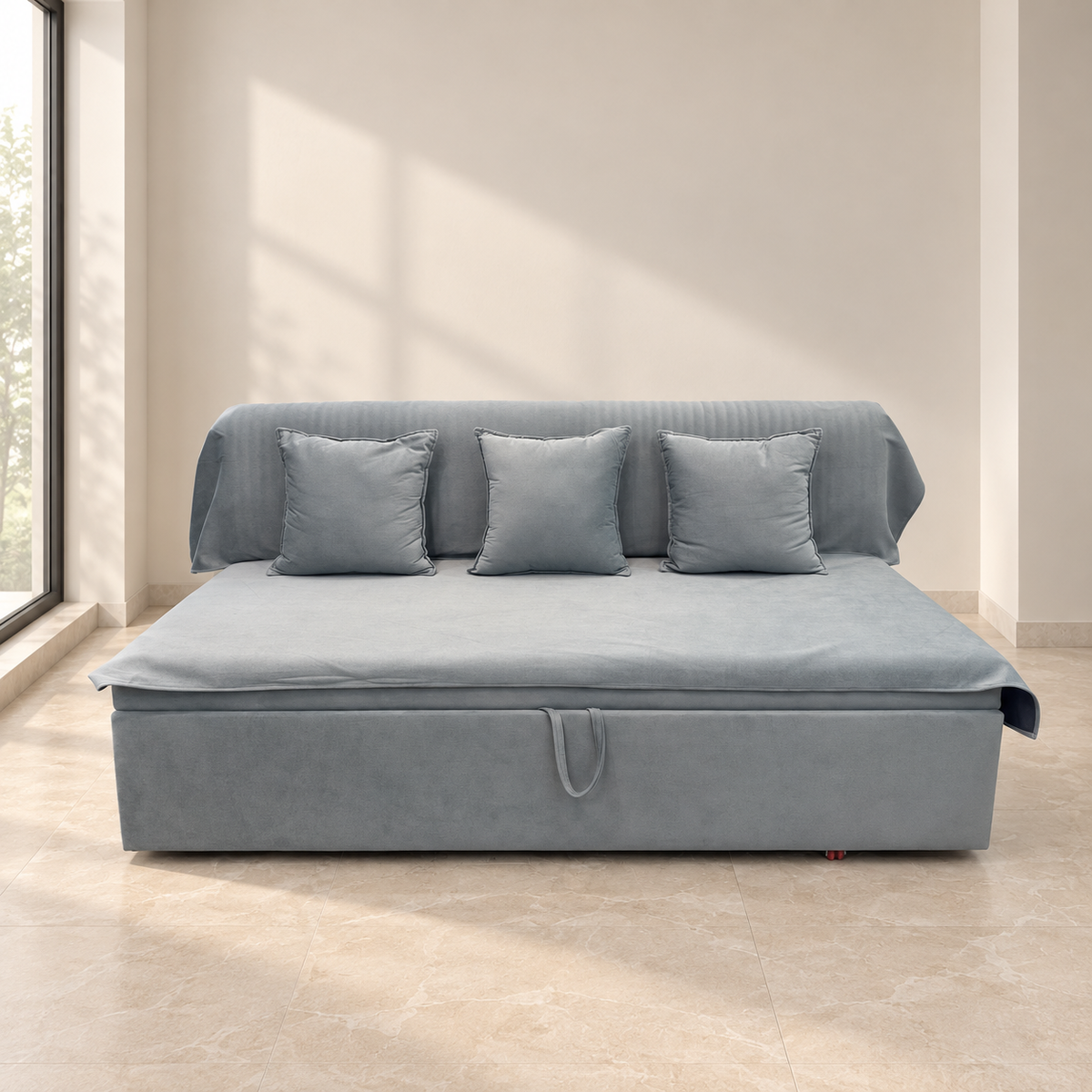 Blue-grey sofa cum bed in sofa configuration in a softly lit neutral room