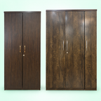 Two engineered wood almirahs: newer 2.5-door unit and older 2-door unit