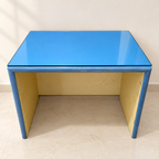 Glass Top Study Table (Blue) in a neutral room