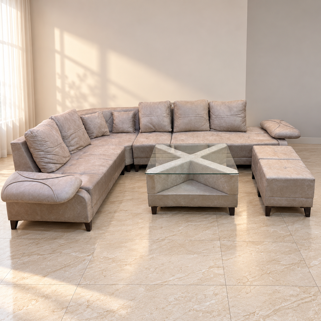 Fabric Corner Sofa with Glass-Top Table and Two Ottomans in a neutral room