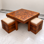 Wooden centre table with exactly two cushioned stools - hero