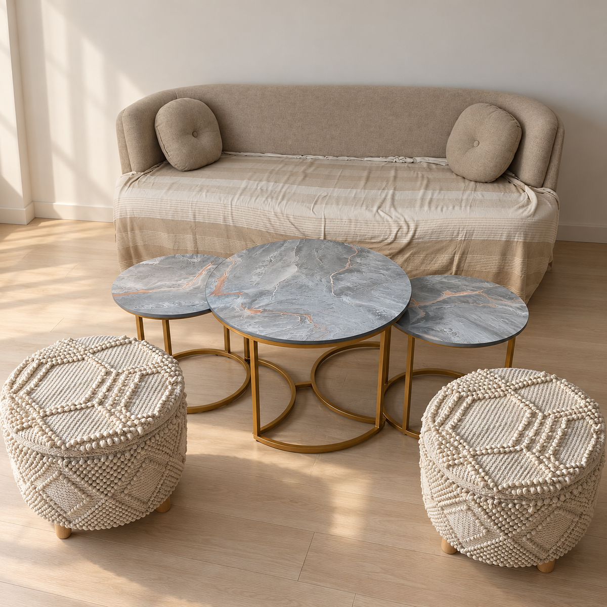 Beige sofa, two ottomans and three round tables