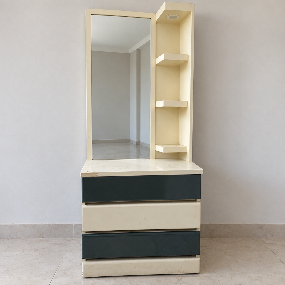 Cream and dark green dressing table with mirror, drawers and shelves, surface wear preserved