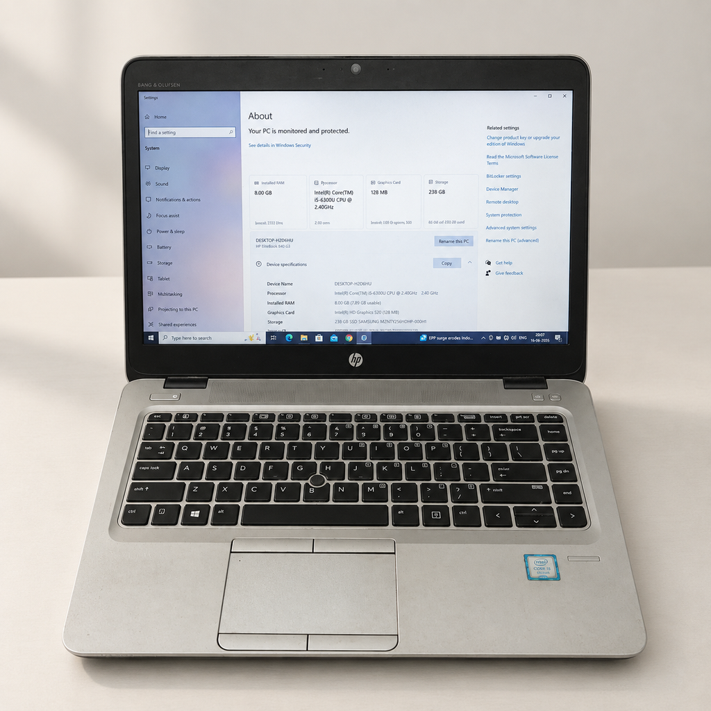 Pre-owned silver HP EliteBook laptop with visible cosmetic wear