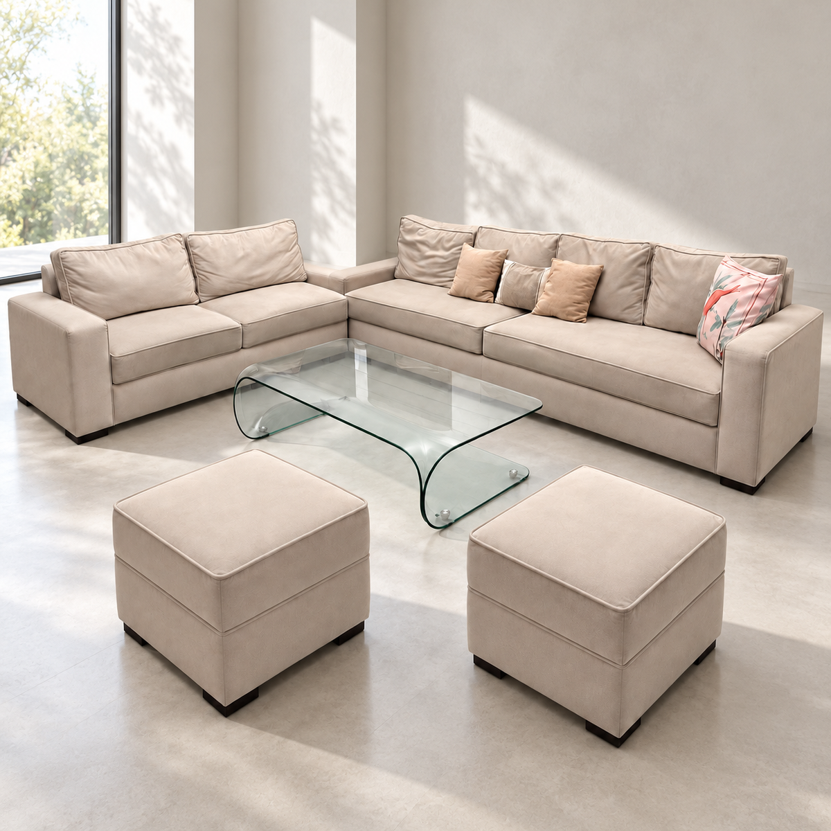 L-shape sofa set with two pouffes and curved glass centre table in a softly lit neutral living room