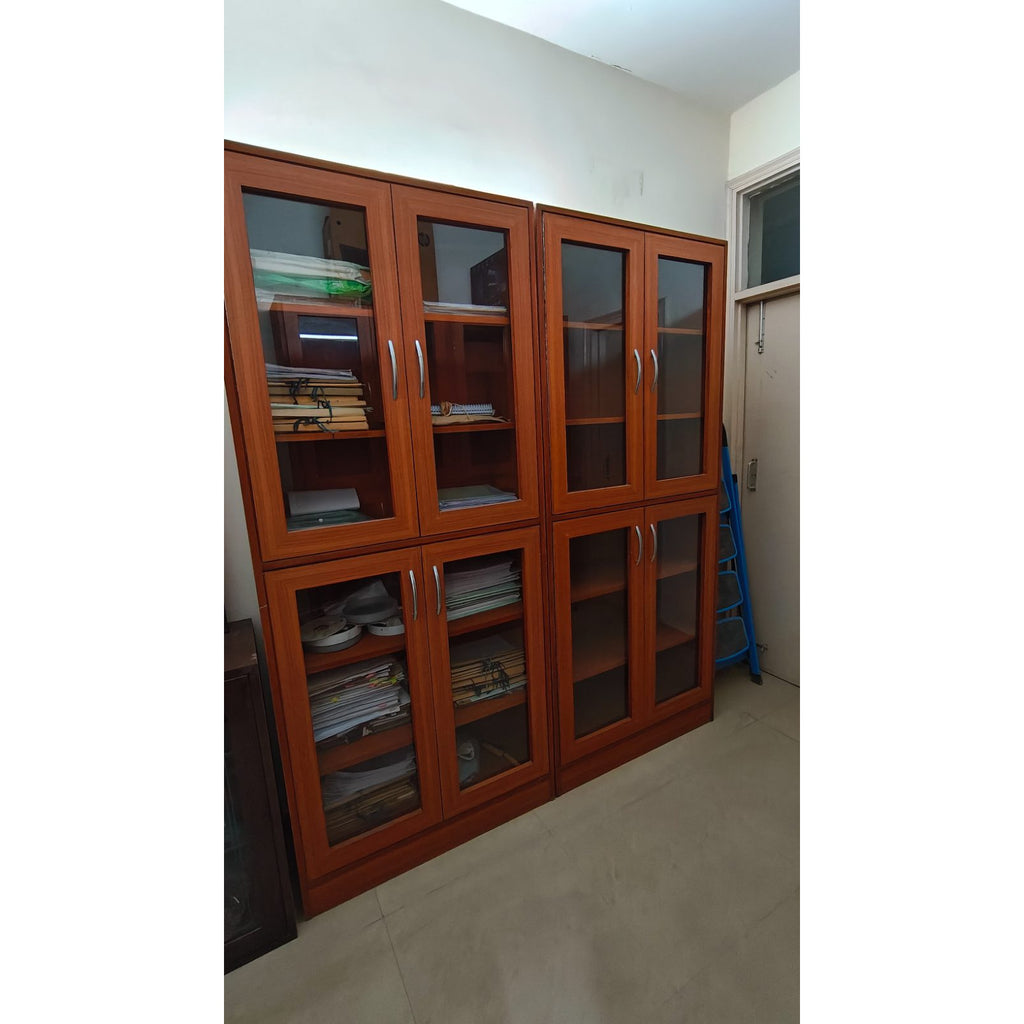 Two 4-Door Glass Bookcases (Teak Finish) - used bookcase in Noida - photo 1