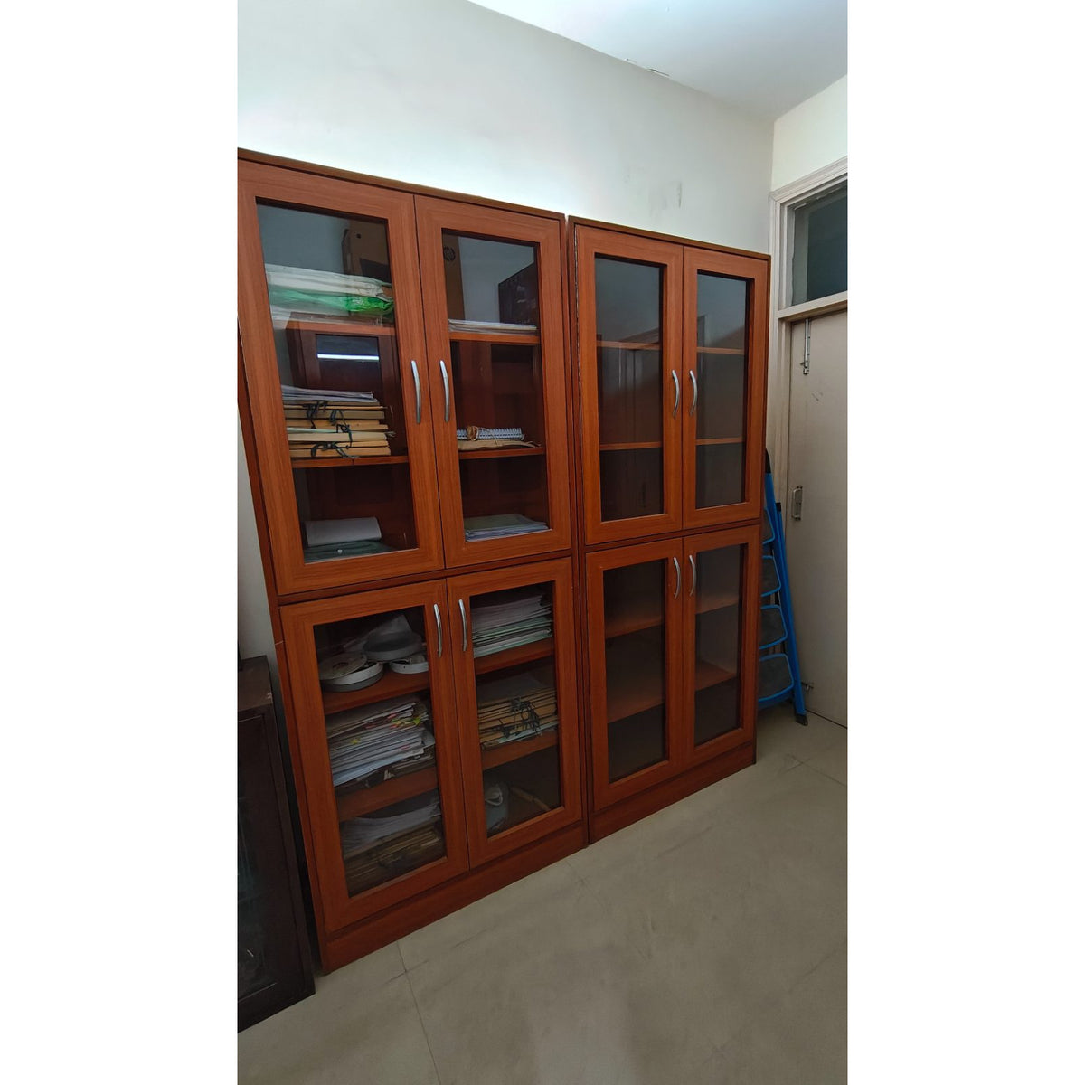 Two 4-Door Glass Bookcases (Teak Finish) - used bookcase in Noida - photo 1
